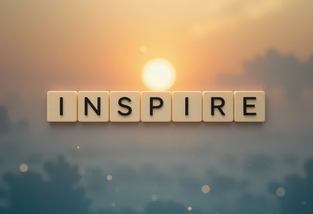 This artistic image features letter tiles spelling "INSPIRING" against a beautiful sunrise backdrop, evoking feelings of motivation and positivity. Ideal for uplifting concepts.の素材