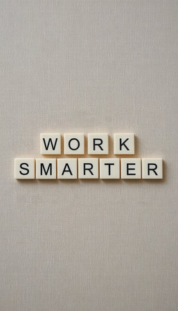 This image features a creative arrangement of letters spelling "WORK SMARTER," conveying a strong message of productivity and efficiency for personal and professional growth.の素材