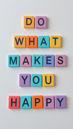 Colorful tiles display the motivational phrase "Do What Makes You Happy." This bright image inspires joy and positivity, perfect for personal growth and encouragement.の素材