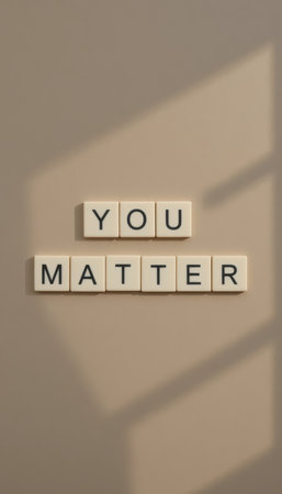 A minimalist arrangement of tiles displaying the words "You Matter," emphasizing the importance of self-worth and encouragement in daily life. Perfect for home decor.の素材