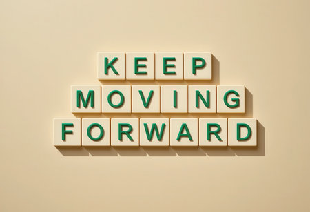 A minimalist design featuring the uplifting phrase "Keep Moving Forward" that serves as a daily reminder for growth and motivation. Perfect for home or office decor.の素材