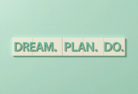 A playful arrangement of text tiles spelling "Dream. Plan. Do." against a calming green wall, perfect for inspiring ambition and creativity in any space.の素材