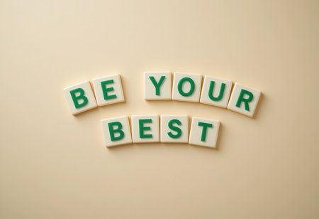 A creative arrangement of letter blocks spelling out an inspirational message. Ideal for themes of motivation, self-improvement, and positivity in personal development.の素材