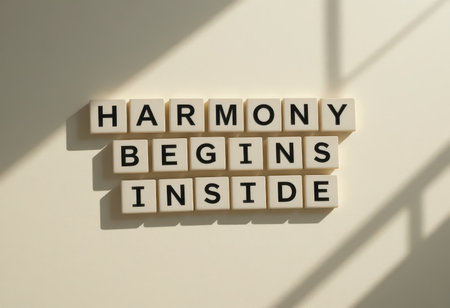 A creative display of letters forming an inspirational message about harmony. The soft light and shadows add depth, creating a serene and motivating atmosphere.の素材