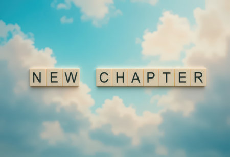 An inspiring composition featuring the phrase "New Chapter" against a serene sky and cloud backdrop, ideal for themes of growth, change, and new beginnings.の素材