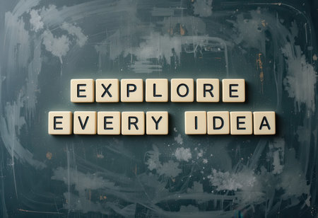 This image showcases letter tiles forming the phrase "Explore Every Idea," embodying a spirit of creativity and innovation in various fields. Perfect for educational and business contexts.の素材