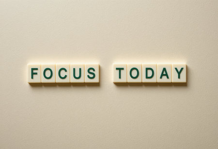A simple and inspiring display featuring the words "Focus Today" on a neutral background. This image serves as a reminder for motivation and productivity in daily life.の素材
