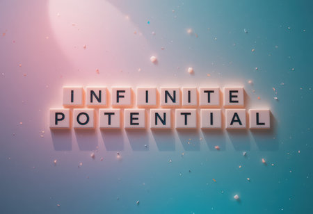A visually appealing arrangement of letter blocks spelling "Infinite Potential" against a soft, pastel background, symbolizing creativity and motivation.の素材