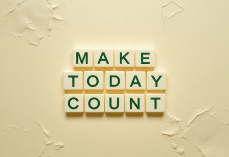A motivational display of letter blocks spelling "Make Today Count" against a light background. Perfect for inspiring creativity and positive thinking in any setting.の素材