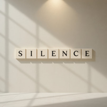 This minimalist image features wooden blocks spelling "SILENCE," casting shadows on a clean wall. It evokes tranquility and modern design, perfect for various themes.の素材