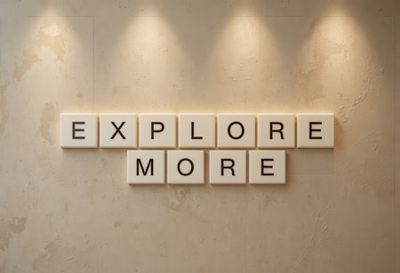 This image showcases a creative wall art piece featuring the inspiring message "Explore More." The modern design and soft lighting create an inviting ambiance.の素材