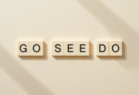 A minimalist composition featuring the motivational phrase "Go See Do" in bold letters on a neutral background, conveying a sense of action and inspiration.の素材
