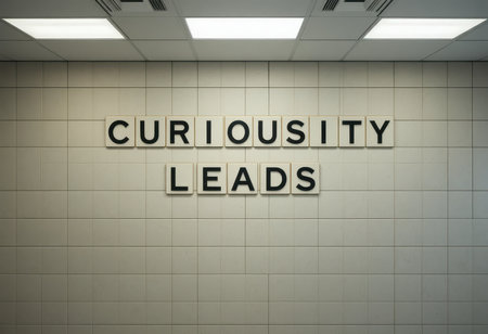Explore the powerful message "Curiosity Leads" displayed prominently in a modern interior. Ideal for themes of inspiration, creativity, and motivation.の素材