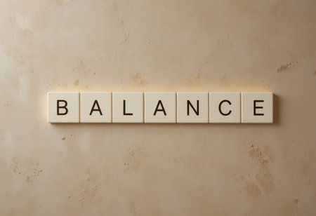 This image features the word "BALANCE" arranged in clean letters against a textured background, symbolizing harmony and stability in design and life.の素材