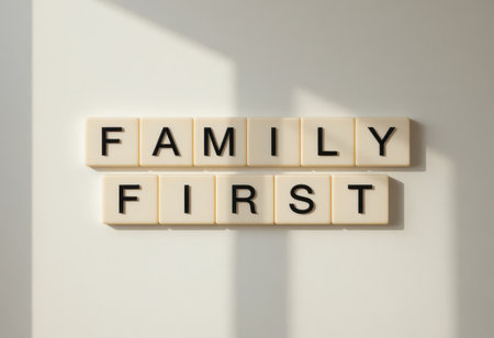 A stylish arrangement of letter tiles spelling 'Family First', perfect for home decor. This minimal design emphasizes family value and connection in any space.の素材