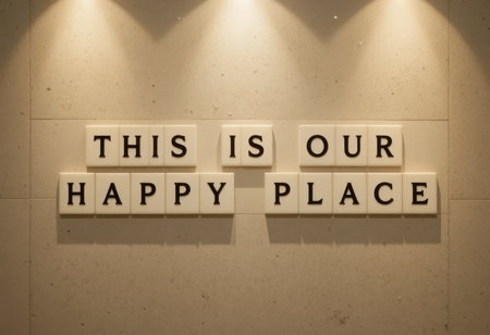 A beautiful wall art piece featuring the phrase "This is Our Happy Place" in elegant lettering, perfect for adding warmth and positivity to any space.の素材