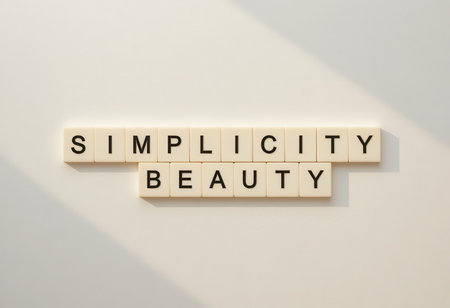 This image features simple letter blocks arranged to convey the themes of simplicity and beauty, ideal for inspirational design projects or minimalist art.の素材