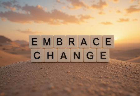 This captivating image captures the phrase "Embrace Change" in a tranquil desert scene at sunset, symbolizing inspiration and personal growth amidst nature's beauty.の素材