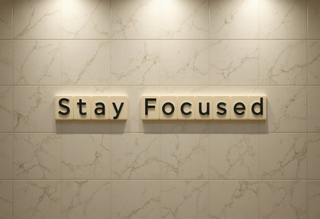 A stylish wall art display featuring the motivational quote "Stay Focused." This elegant design enhances office decor, promoting productivity and positive energy in any workspace.の素材