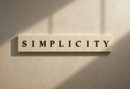 This image captures the essence of simplicity through elegant typography set against a neutral background. Ideal for modern decor themes.の素材