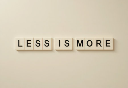 This image showcases a minimalist approach with the phrase "Less is More" displayed in block letters, emphasizing simplicity and clarity in design and communication.の素材