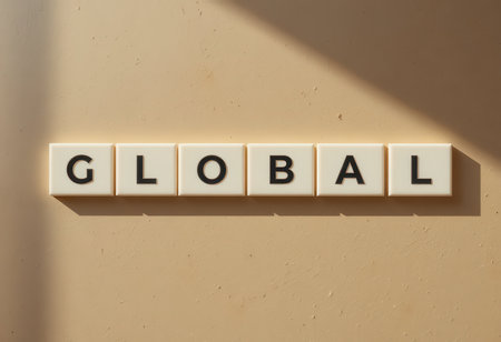 This image features letter tiles spelling "GLOBAL" against a warm background, symbolizing international connection and collaboration. Perfect for themes of unity and communication.の素材