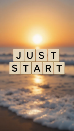 Bright letters on a serene beach at sunrise convey a motivational message to inspire new beginnings and encourage personal growth in a tranquil setting.の素材