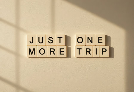 A motivational quote displayed with tiles on a wall, inspiring hope for future adventures and travels. Perfect for travel enthusiasts and dreamers.の素材