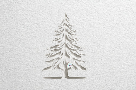 A beautiful paper cut illustration of a Christmas tree, showcasing intricate details on a textured white background. Ideal for seasonal design projects.の素材