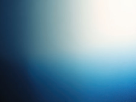 A beautiful soft blue gradient background with subtle light suitable for various design projects, providing a peaceful and calm atmosphere for creative endeavors.の素材