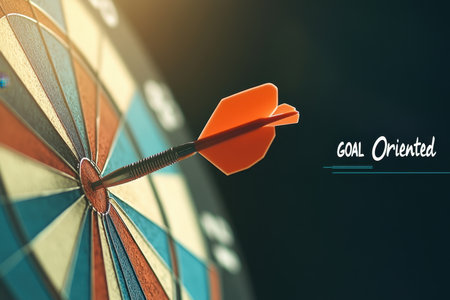 This dynamic image showcases a dart hitting the bullseye of a dartboard, symbolizing focus and the determination needed to achieve goals in various endeavors.の素材