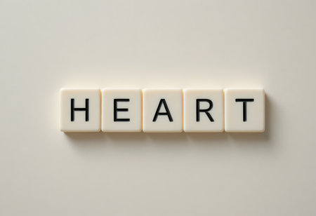 This image features tiles displaying the word "HEART" in bold letters on a clean, white background. Perfect for concepts of love and emotion.の素材