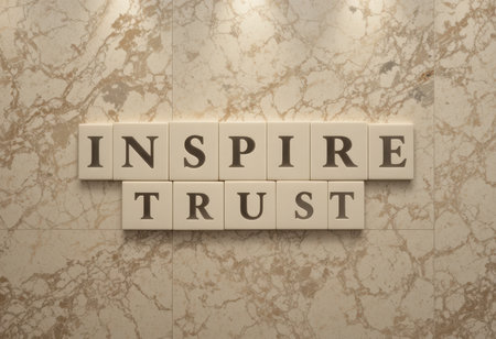 This image features the words "Inspire Trust" displayed on a stylish marble background, perfect for conveying messages of confidence and motivation in various settings.の素材