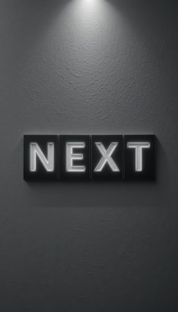 A sleek neon sign displaying the word "NEXT" illuminated on a dark wall, perfect for modern decor, creative business themes, or inspirational spaces.の素材