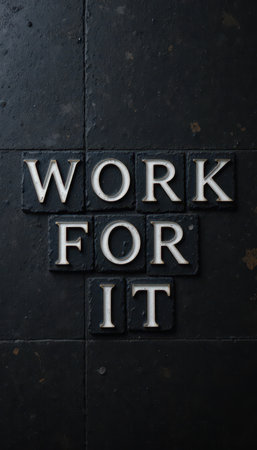 A striking image featuring the text "WORK FOR IT" crafted from blocks on a dark background. This motivational design serves as an inspiration for ambition and perseverance.の素材