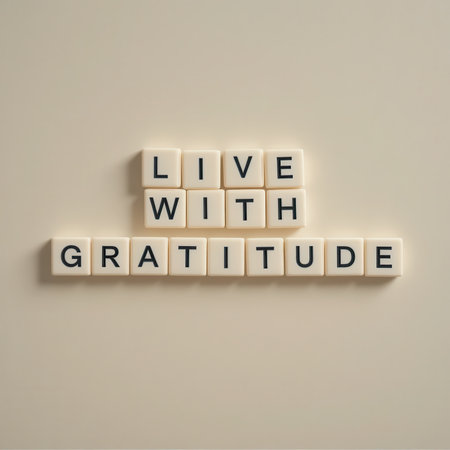A minimalistic arrangement of letter tiles spells out "Live with Gratitude," offering an uplifting reminder of positivity and appreciation in daily life.の素材