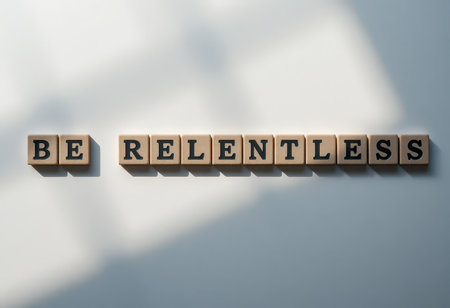 A captivating arrangement of wooden letter blocks spelling "BE RELENTLESS," symbolizing motivation and determination. Perfect for inspiring messages and decor.の素材