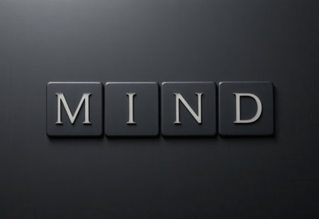 A striking image featuring the word "Mind" in elegant typography against a minimalist background. This visual represents thoughts, intelligence, and reflection.の素材