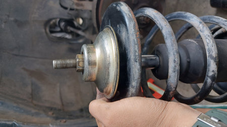 Automotive repair work focused on old car suspension components. Includes absorber servicing,...