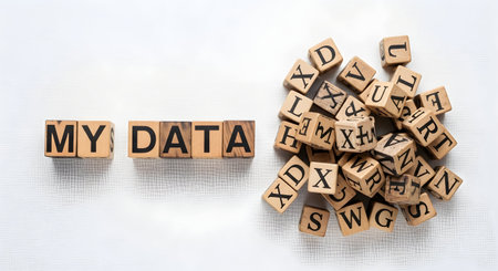 Wooden cubes with letters on a white background with copy space.の素材