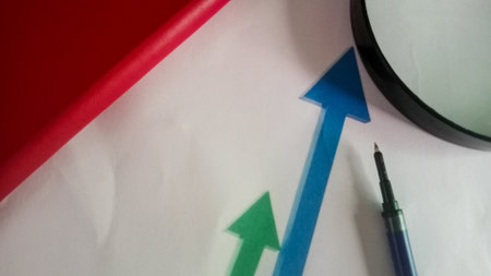 Close up view of business graph and chart on white paper background.の写真素材