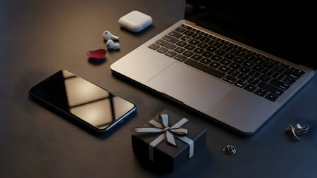 Laptop, smartphone and gift box on the table. Online shopping concept.の素材
