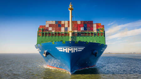 Biggest containership HMM Algeciras on the Western Scheldtのeditorial素材