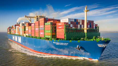 Biggest containership HMM Algeciras on the Western Scheldtのeditorial素材