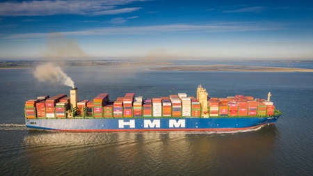 Biggest containership HMM Algeciras on the Western Scheldtのeditorial素材