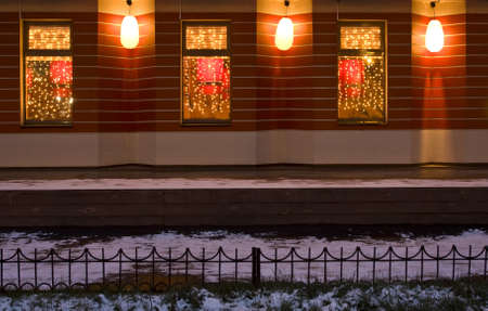 Decoration of garlands of electric lamps on windows of caffe, recorded in Moscow.のeditorial素材