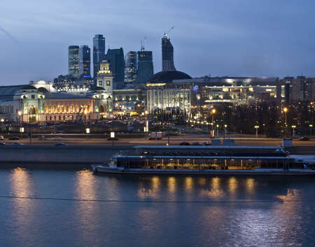 Moscow, Kievskiy railway station on bank of Moscow-river and business centre Moscow-city at night.のeditorial素材