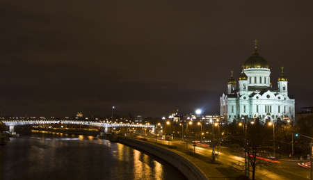 Moscow, Russia - November 24, 2011: cathedral of Jesus Christ Saviour and Patriarch bridge on bank of Moscow-river at night.のeditorial素材