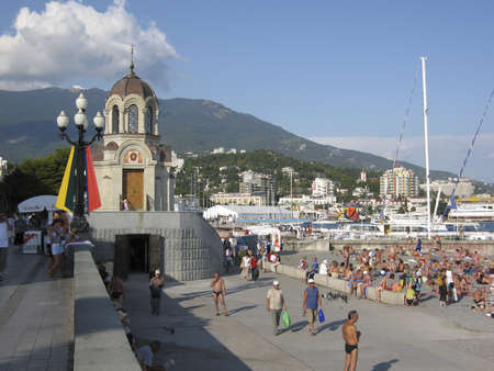 Yalta, Crimea, Black sea - September 05, 2009: embankment and chapel of Alexander Nevskiy. Yalta - famous resort in region Crimea on Black sea, called のeditorial素材