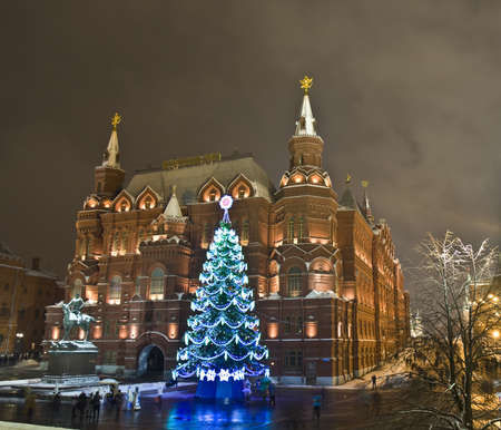 Moscow, Russia - January 09, 2012: christmas tree on Manezhnaya square and Historical museum.